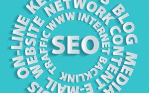 “SEO spiral graphic with related terms such as website, content, blog, traffic, keywords and backlinks on turquoise background.